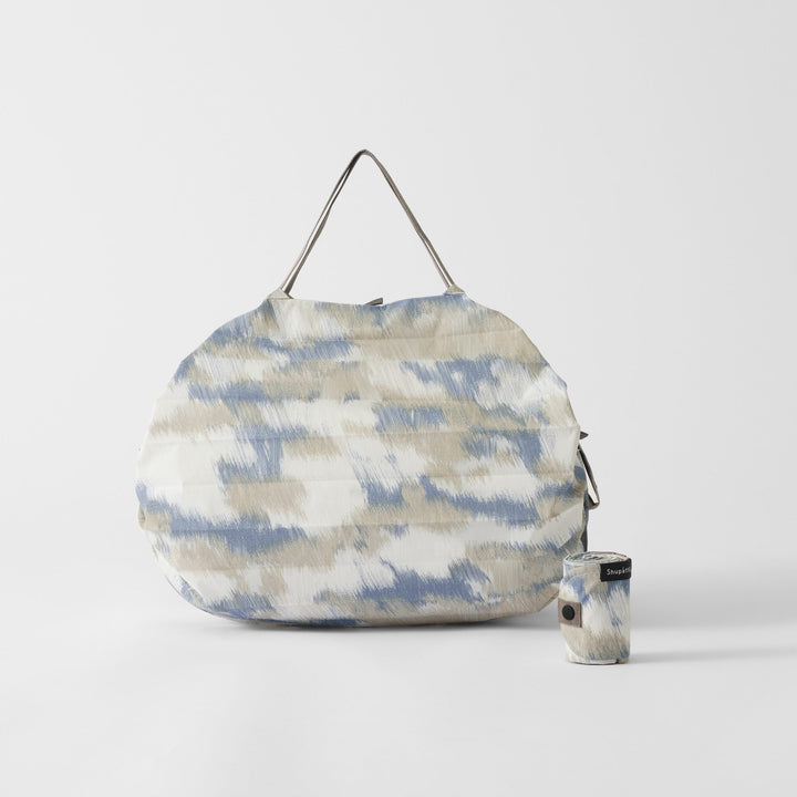 Shupatto Einkaufstasche Falttasche Shupatto - Floating Clouds - medium bei Nauli and Stories
