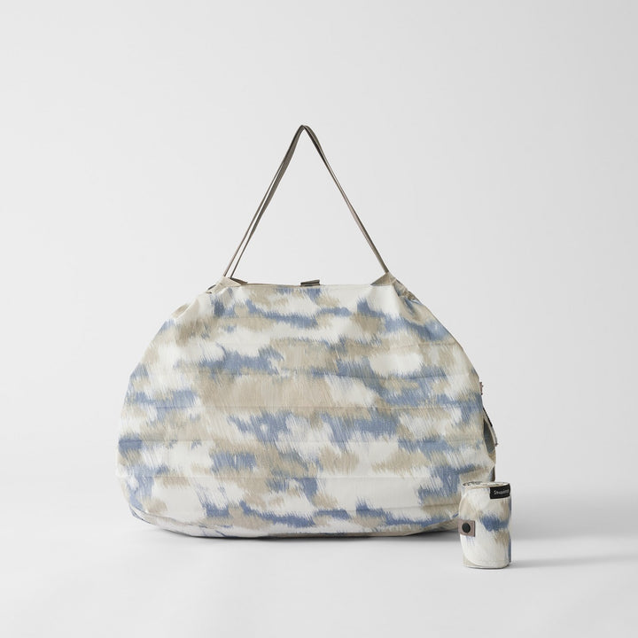 Shupatto Einkaufstasche Shupatto kompakte Falttasche  L - Floating Clouds bei Nauli and Stories