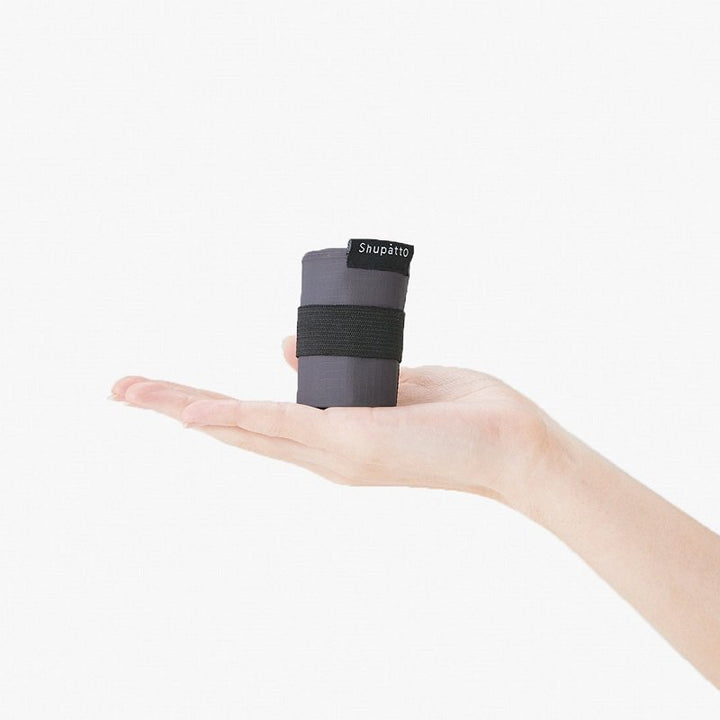 Shupatto Einkaufstasche Shupatto kompakte Falttasche S CHARCOAL / SUMI bei Nauli and Stories