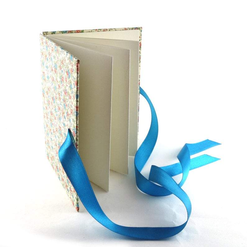 Nauli Leporello Leporello mille fleur türkis bei Nauli and Stories