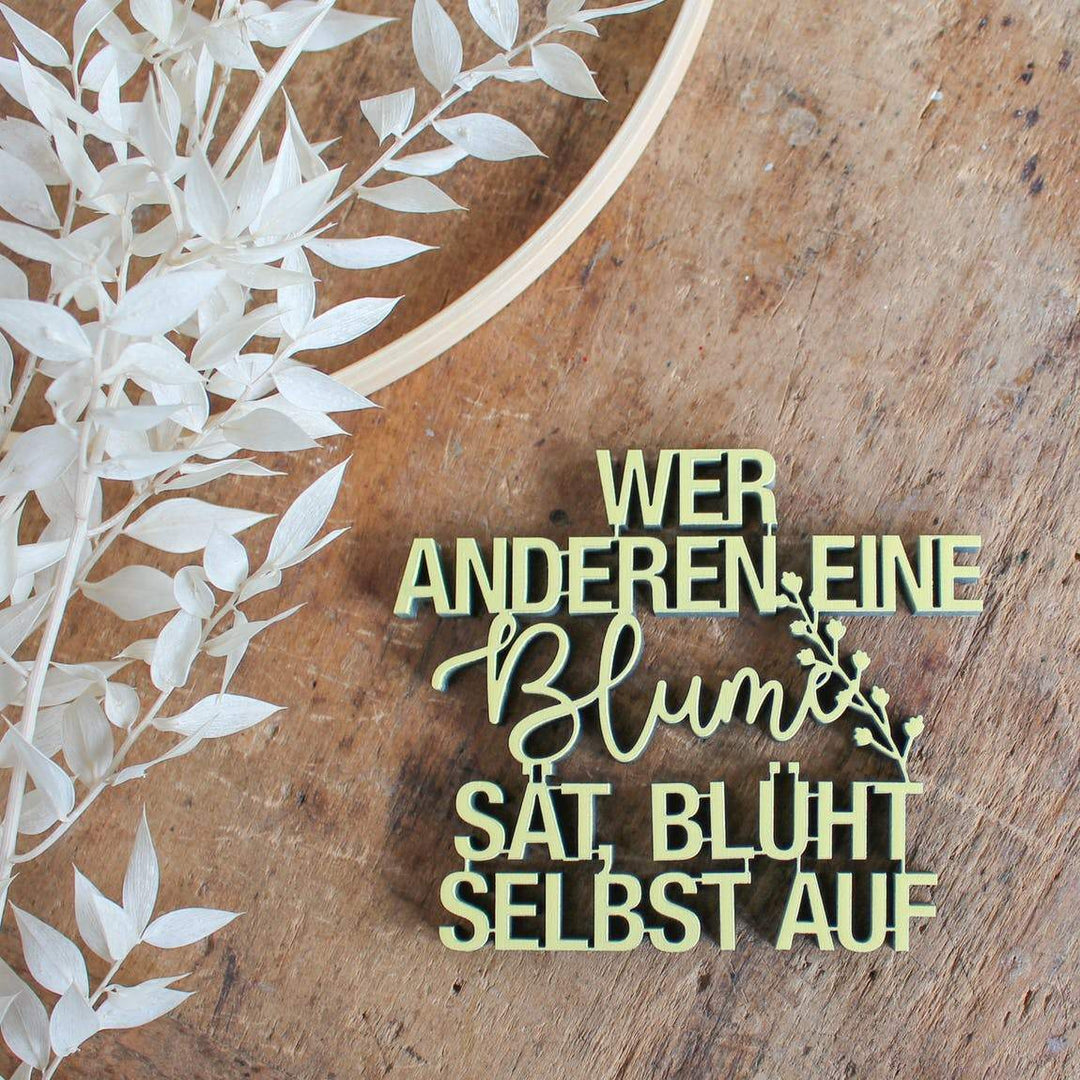 NoGallery Schriftzug Wer anderen eine Blume sät, blüht selbst auf bei Nauli and Stories