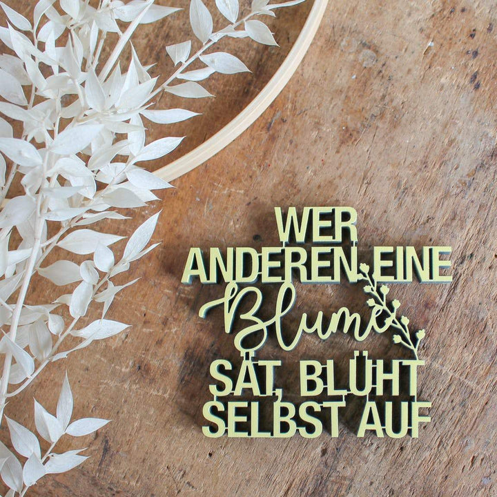 NoGallery Schriftzug Wer anderen eine Blume sät, blüht selbst auf bei Nauli and Stories