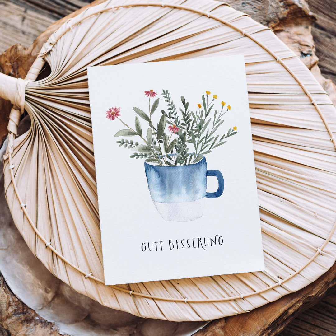 Paperlandscape Genesung Genesungskarte Gute Besserung mit blauer Tasse bei Nauli and Stories