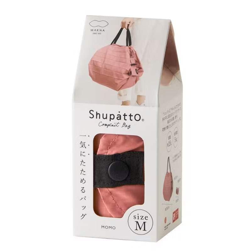 Shupatto Einkaufstasche Shupatto rosa kompakte Falttasche M - uni / Momo bei Nauli and Stories