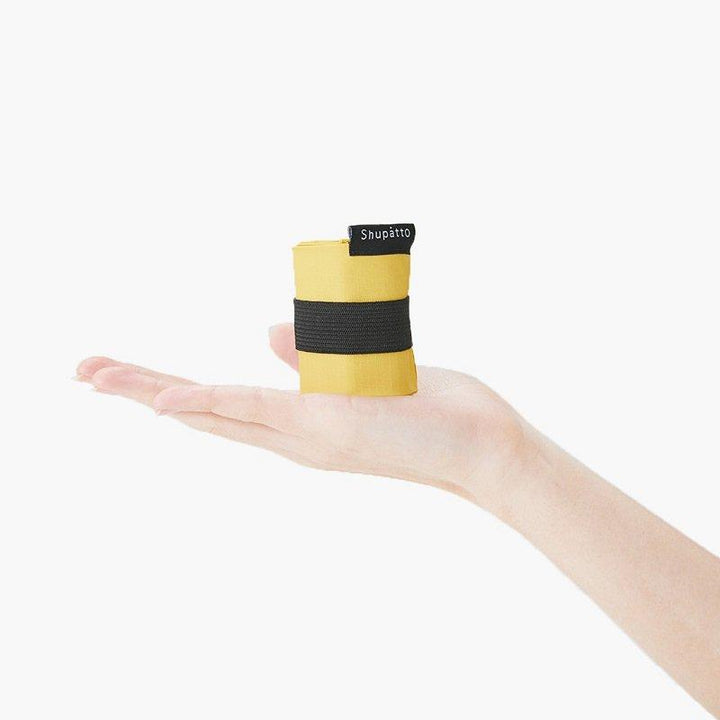 Shupatto Einkaufstasche Shupatto Falttasche S - Mustard (Karashi) bei Nauli and Stories