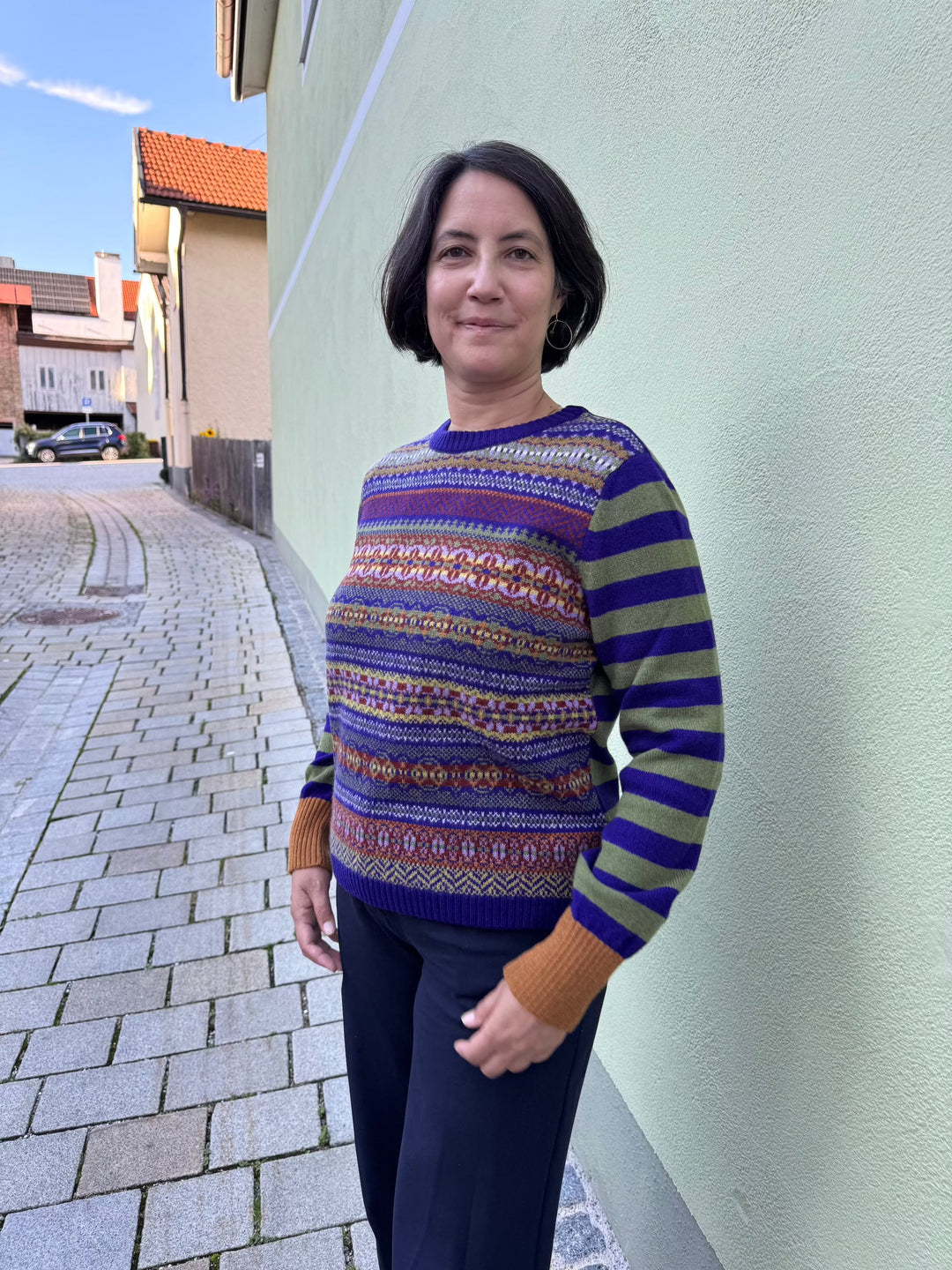 Eribé Pullover Gemusterter Wollpullover | lila grün |Stobo Fairisle Reversible Sweater Mulberry bei Nauli and Stories