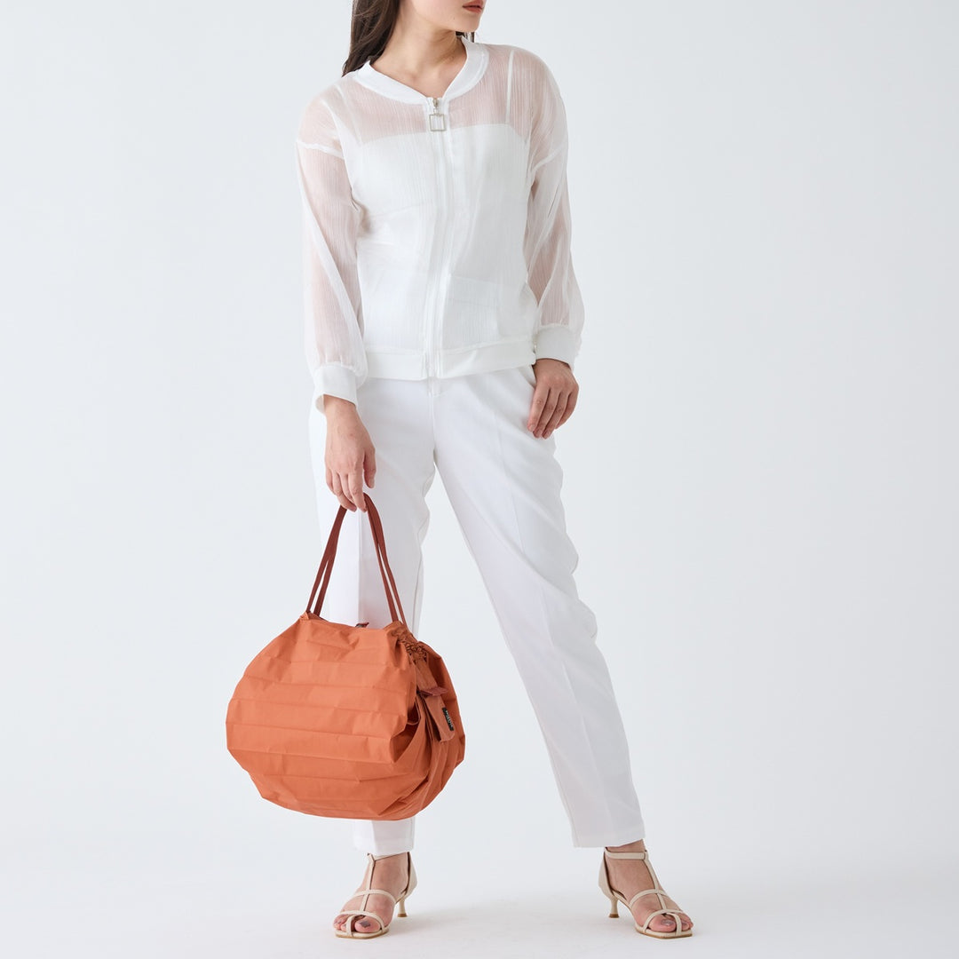 Shupatto Einkaufstasche Shupatto  Bag M – Brick Brown bei Nauli and Stories