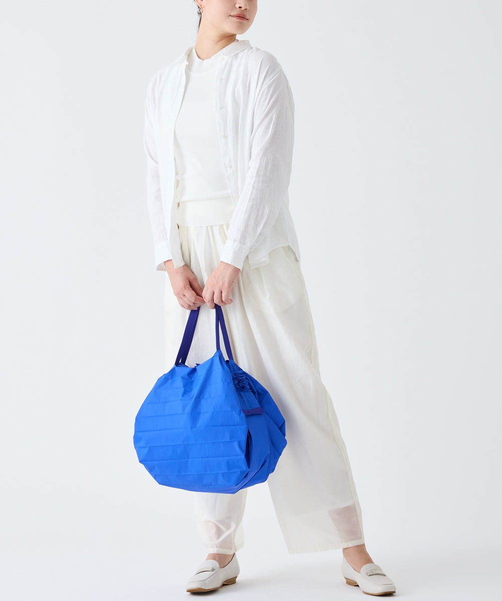 Shupatto Einkaufstasche Shupatto  Bag M – Clear Sky bei Nauli and Stories