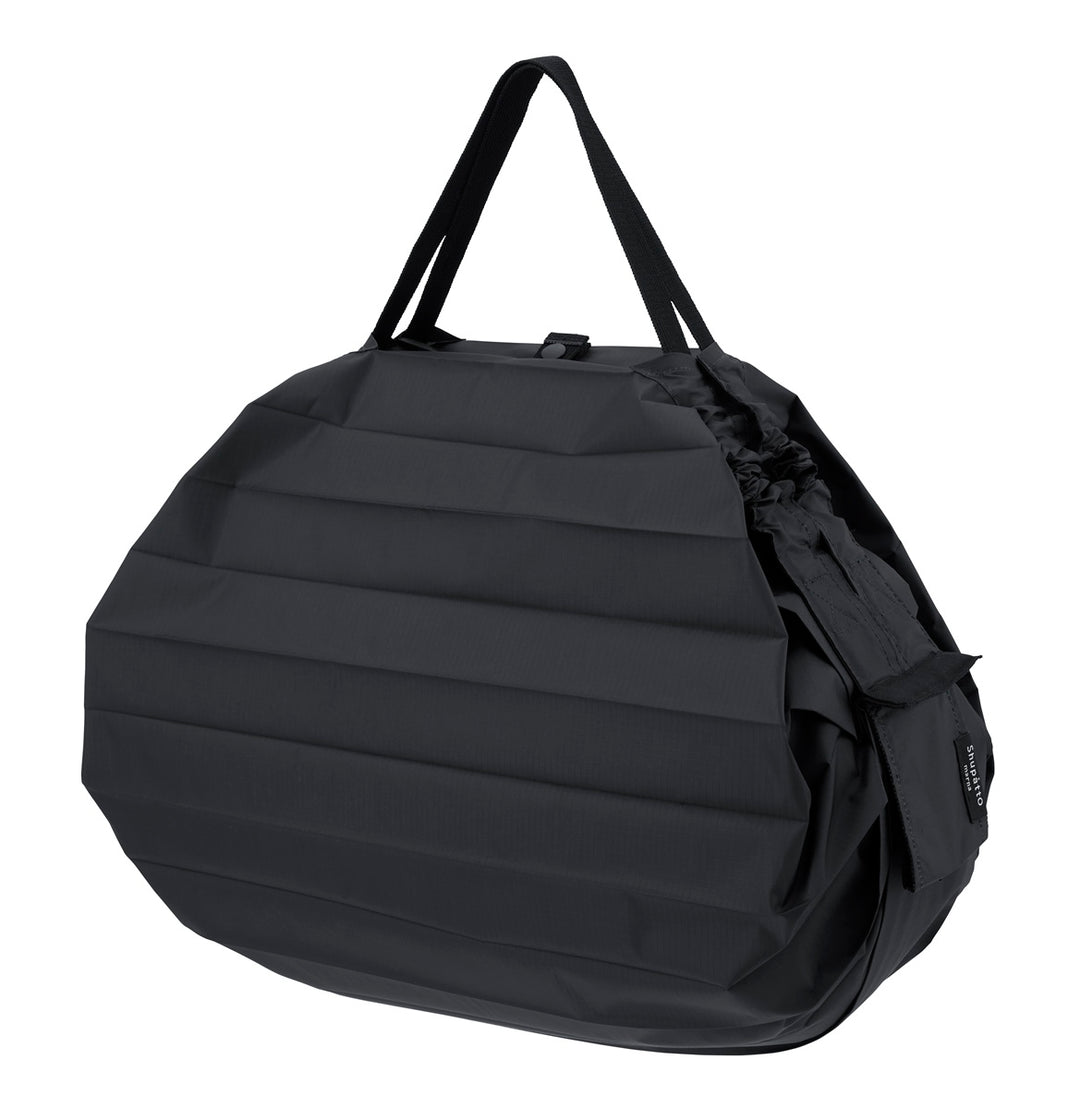 Shupatto Einkaufstasche Shupatto  Bag M – Jet Black bei Nauli and Stories