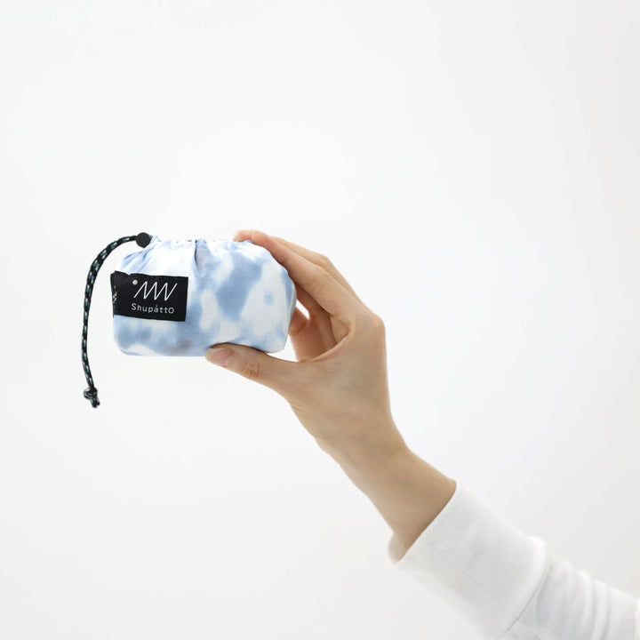 Shupatto Einkaufstasche Shupatto kompakte Packable Bag 27L - Water Surface bei Nauli and Stories