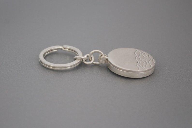 Mabotte Medaillon Medaillon Wellen Schlüsselanhänger aus Silber von Mabotte 22mm